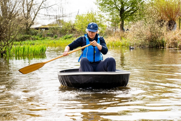 Jayne Kirkham in a coracle landscape. Credit WWT and Amy Alsop.jpg